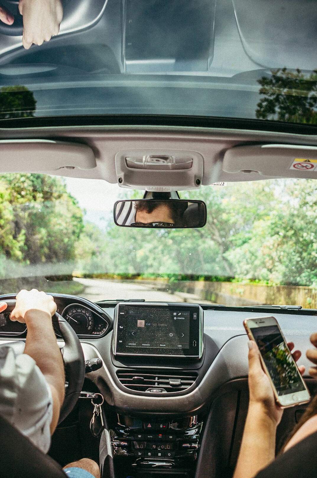 person driving electric car